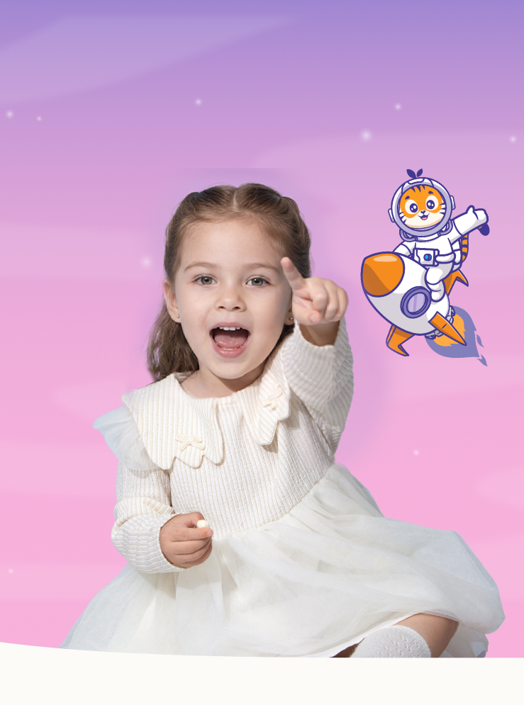 A young girl in a white dress stands next to a display of colorful snack pouches and boxes on a pink and purple gradient background with a white curved base.